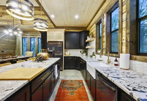 It's more than a kitchen—it's where memories are made. Picture your mornings with coffee and woodland views.