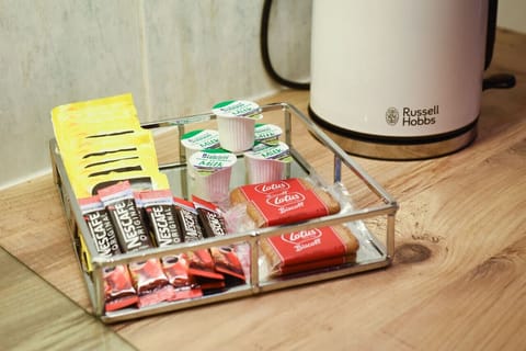 Welcome tray with twinnings tea, coffees, milk and biscoff biscuits