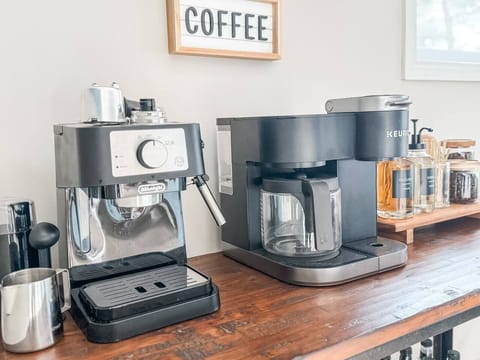 Our coffee station is equipped with our Delongi espresso machine. Fill me up Buttercup!