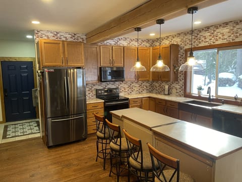 Make meals together in the spacious kitchen. (New Island top being custom made