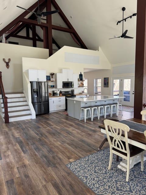 Large open main level with view of loft