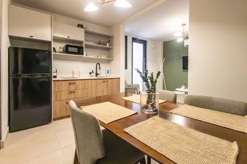 Dining area seats 4 and kitchen for 4 includes stove, microwave and refrigerator.