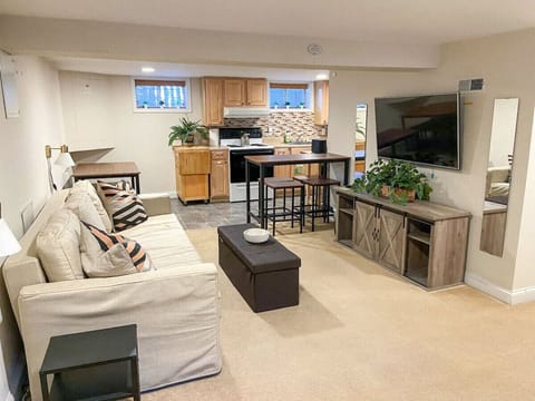 Spacious living room with full access TV, Wii gaming system, and board games!