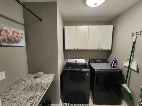 Includes iron & ironing board.