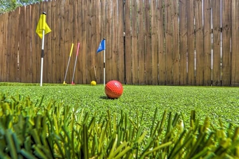 The back yard includes a putting green with equipment provided. Great for some friendly competition!