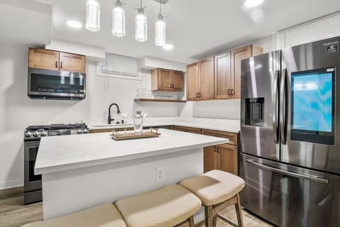 The fully equipped kitchen includes all the cooking and dining essentials you'll need to prepare your meals.