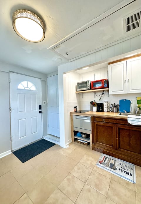 Kitchen: Refrigerator, Dishwasher, Microwave, Single Toaster, Induction Stove.