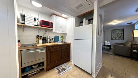Kitchen: Refrigerator, Dishwasher, Microwave, Single Toaster, Induction Stove.