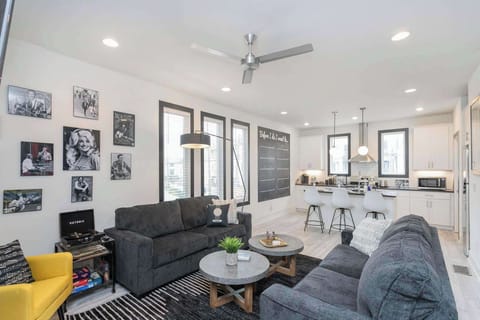 2nd Level: Living Room w/Custom Mural, Sleeper Sofa + Fireplace