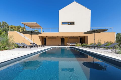 The beautiful swimming pool is overlooked by a loggia2024-06-29 Villa David @ Stari Grad-3