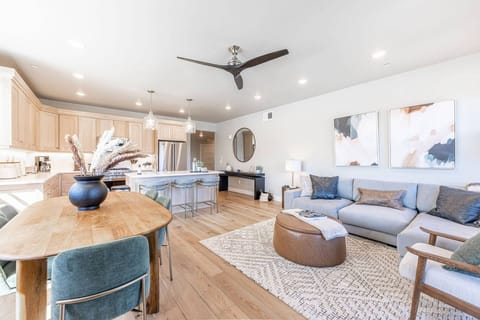 Mountain-modern living room in Deer Valley East Mayflower Lakeside condo with plush seating and natural light.