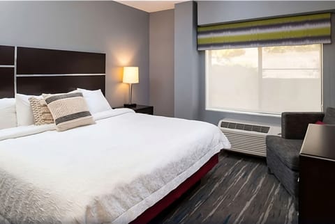 Wake up to soft daylight and smooth, hotel-quality bedding.