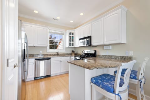 Prepare a meal in the kitchen or enjoy coffee at the bar