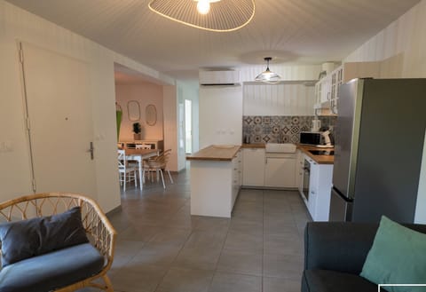 Large air-conditioned living room with open kitchen and Wi-Fi