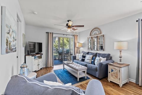 This comfy living room offers space for everyone to gather!