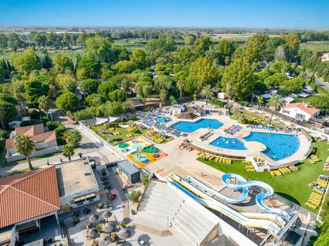 A bird's-eye view of aquatic fun – modern pools and slides await for family enjoyment.