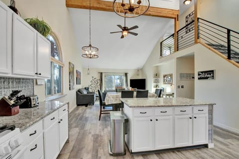 Open living space with views of Pikes peak out large sliding door. 