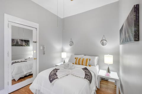Full size bedroom and bed with closet space, plush linen and comforters, soft lighting and a great energy to rest and enjoy a good nights sleep.
