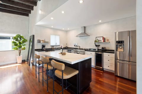 The kitchen offers all cooking essentials and stainless steel appliances