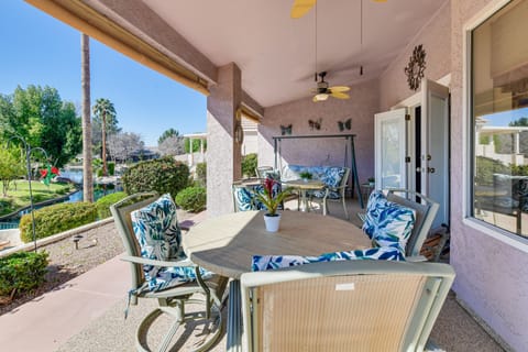 Furnished Porch | Outdoor Dining | Pond & Waterfall View