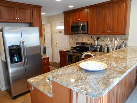 A view of the kitchen from the dining room side.