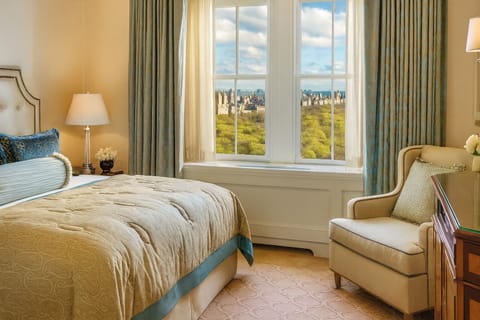 Wake up to sweeping park views from a plush bed