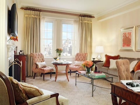 Gather for cocktails beside sunlit windows and cozy seating