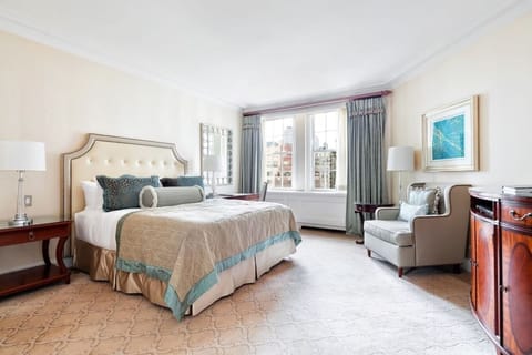 Sink into crisp linens and enjoy sunlit, serene comfort.