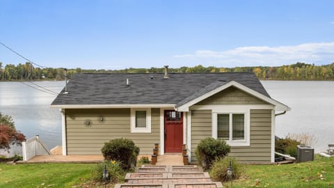 2 Floor home with walkout to sandy waterfont. CURRENT: Lake Level LOW