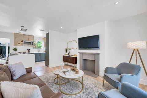 Living room | Comfy sofa and chairs + a smart tv