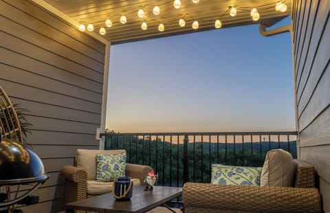 Cozy evening on the balcony with string lights and amazing view!
