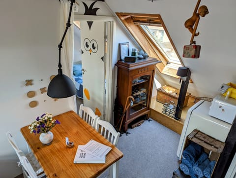View from the loft down the open room in the kitchen end