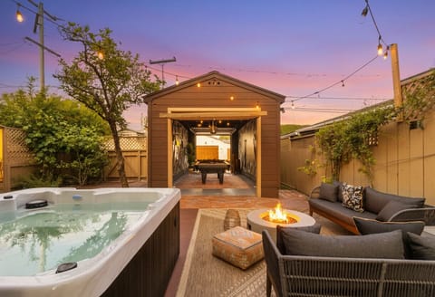 Enjoy the hot tub, garage game room with pool table, darts and fun atmosphere.