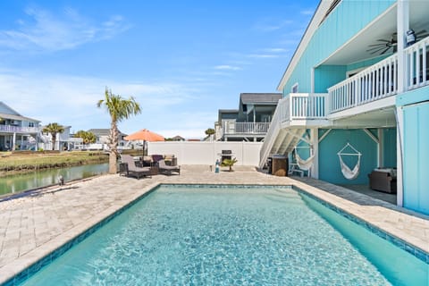 Above The Waves and into the pool for a week of fun at the beach.