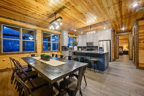 The kitchen is plenty big, with ample seating options and prep/serving space for those large meals!