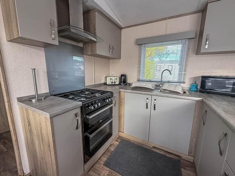 Cozy kitchen with modern appliances and natural light