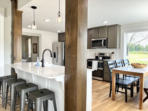 Bar seating for 4 and a table for 6