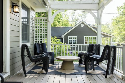 Sit on the front porch in style, with a drink in hand, watching the river.