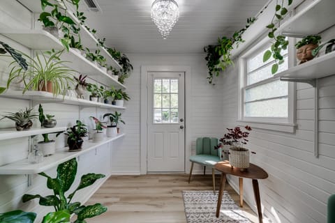 Plant Haven for you plant lovers, with a sitting area.