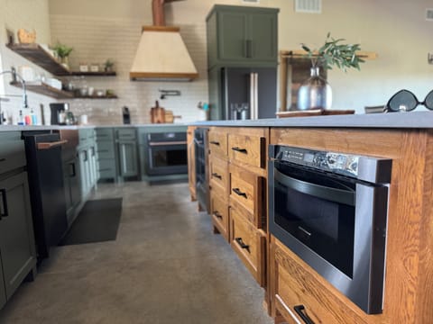 Filtered H20 System, Espresso Machine, Wine Frig, Ice Trays, Induction Stove Top