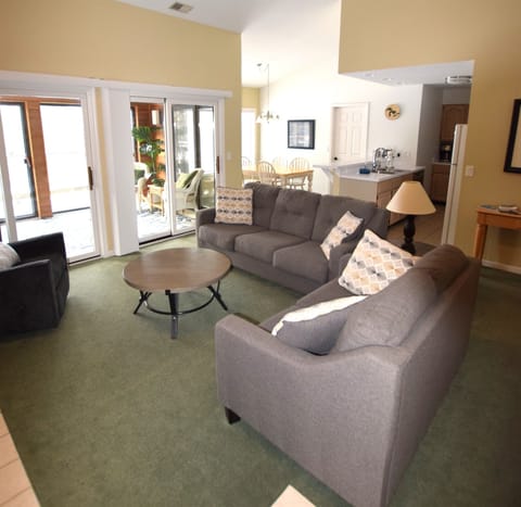 Living area and view of enclosed porch