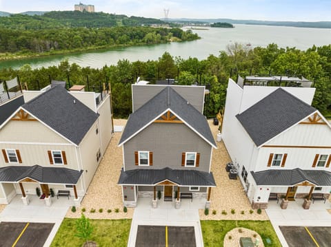 BIG DIPPER (left) and STARRY COVE (middle) are 2-story homes with 6 bedrooms each w/ 3rd story rooftop deck overlooking Table Rock Lake