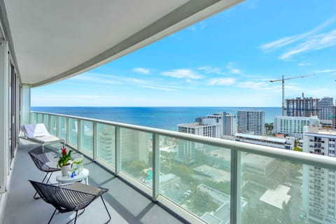 Private Balcony | Ocean view with a conversation seating area.