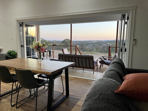 View from dining area to deck through the beautiful french bifold doors
