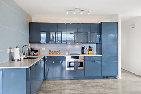 Sleek kitchen with lots of cupboard space