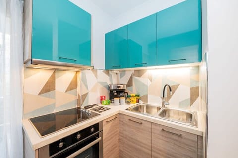 Fully equipped kitchen space – Prepare meals with ease in this colorful, cheerful kitchen

