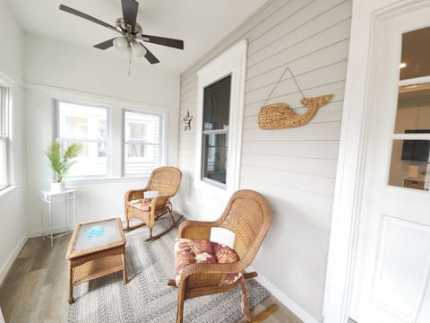 Entry Sunroom with Rocking Chairs