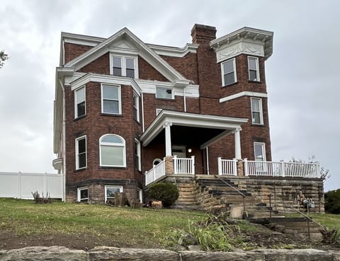 Grand 1210 Tyndal: Victorian mansion blending old-world charm & modern luxury.