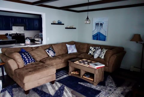 Rolling up on the spacious couch to watch a movie.