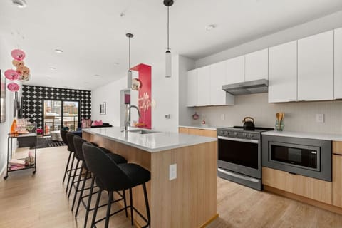 Open space kitchen with all the dishes, condiments, and amenities you could dream of (olive oil, avocado oil, balsamic vinegar. local coffee, tea, sugar, spices, etc)